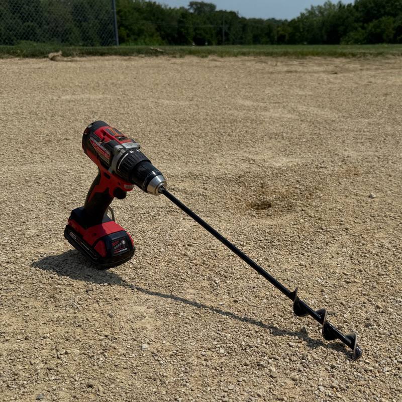 SMART Base Auger attached to a drill on a baseball field